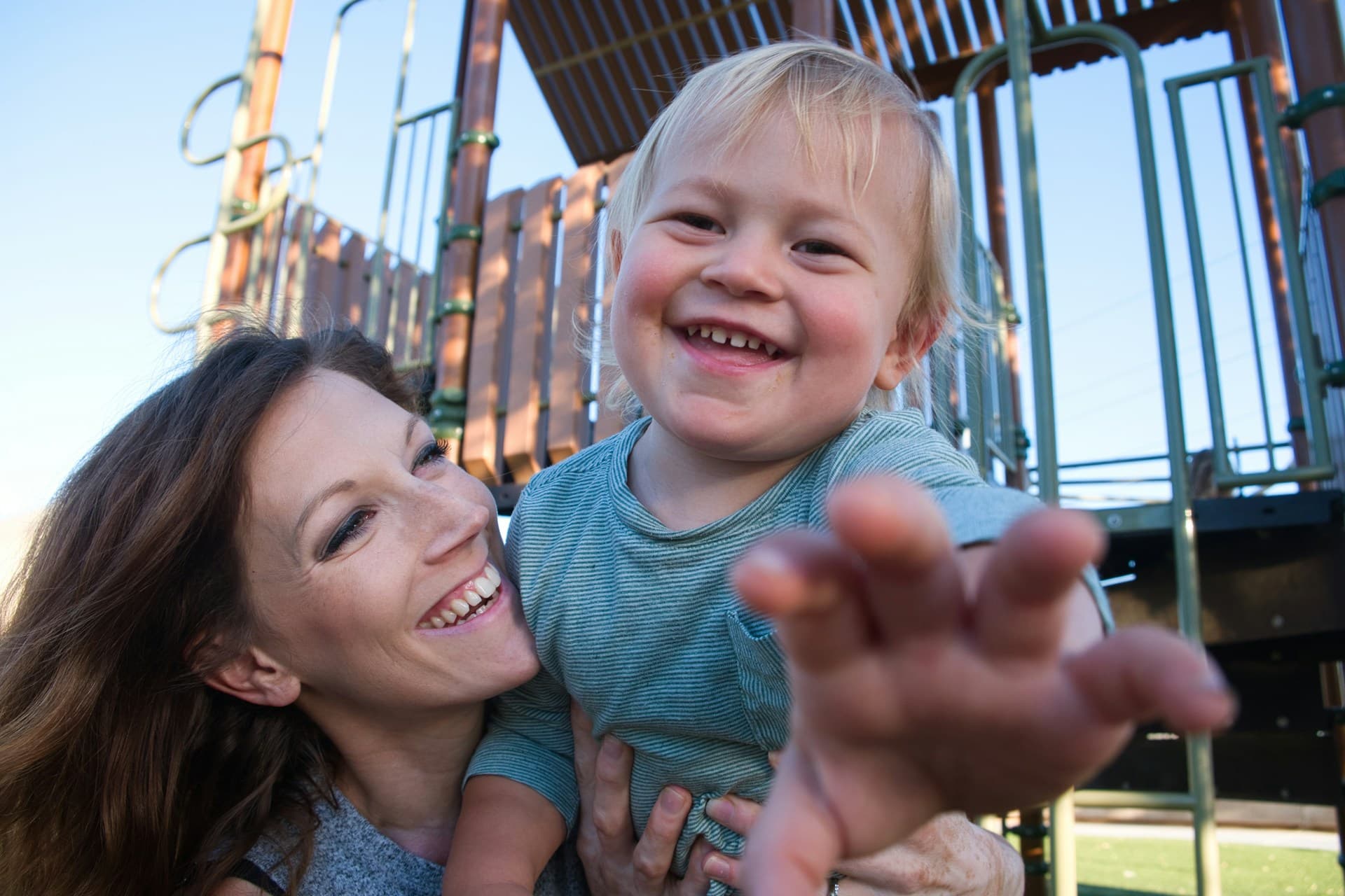 Mother and child playing at playground